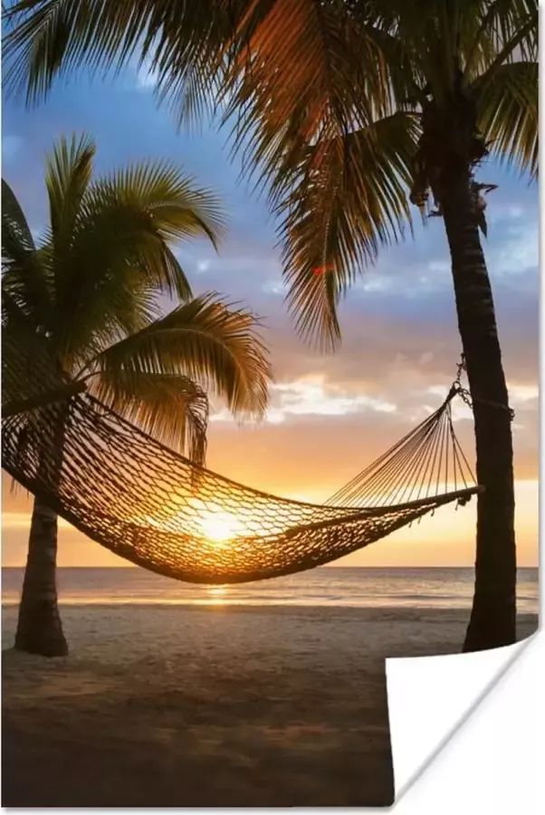 PosterMonkey Poster Hangmat op strand tijdens zonsondergang in Jamaica 40x60 cm