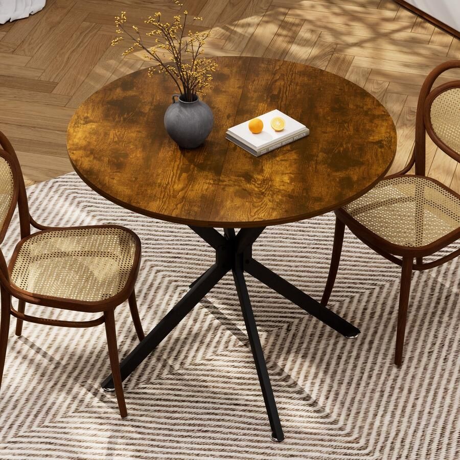 Pugsdrly Ronde eettafel met vier poten van 90 cm in een strakke eigentijdse stijl. Door het compacte ontwerp is deze tafel ideaal voor kleine ruimtes of hoeken van kamers. Gemaakt van spaanplaat en ijzer