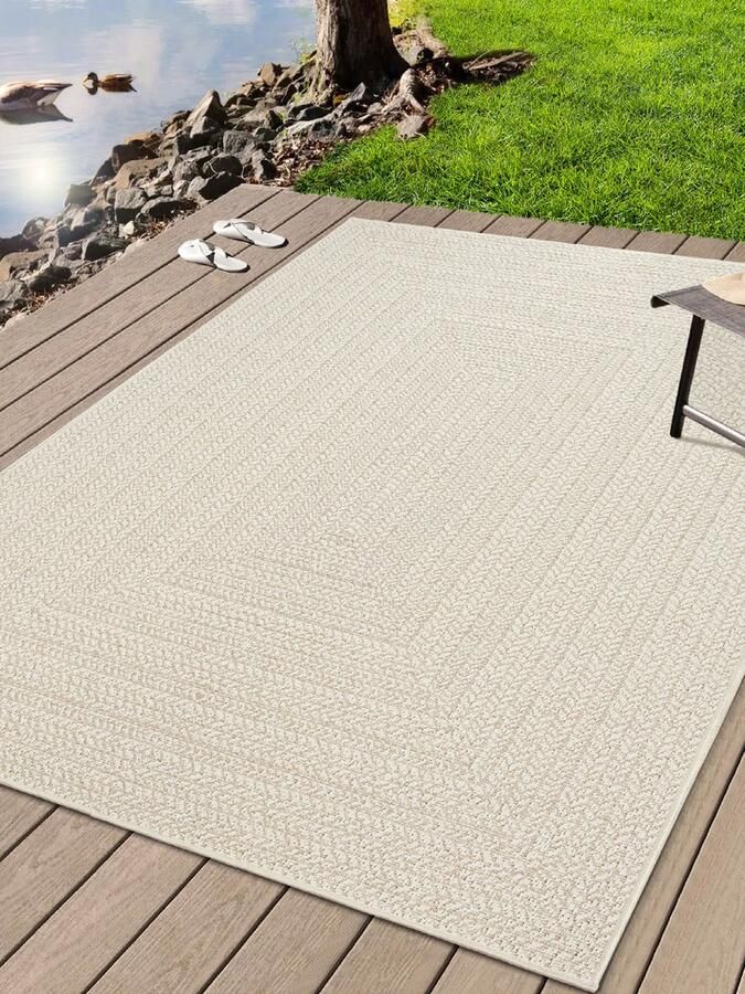 The carpet Kansas – Robuust in- en outdoor vloerkleed met een natuurlijke jute-look weerbestendig geschikt voor terras en tuin Cream 140 x 200 cm