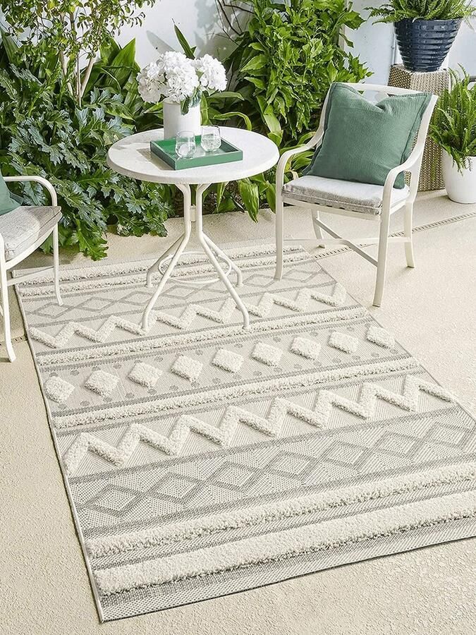 The carpet Karel In & Outdoor is weerbestendig een hoogwaardig vloerkleed (woonkamer) in Boho-design Cream 120 x 170 cm