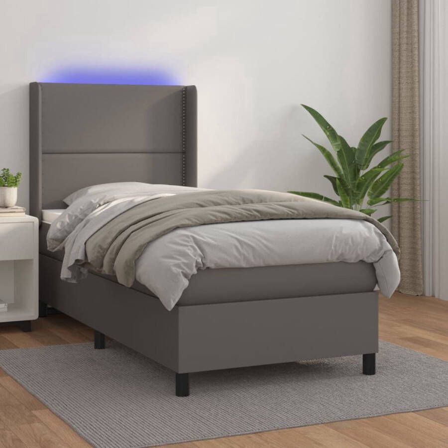 The Living Store Boxspring met matras en LED kunstleer grijs 90x190 cm Bed