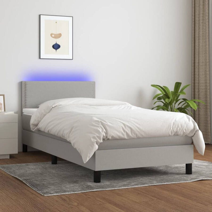 The Living Store Boxspring met matras en LED stof lichtgrijs 100x200 cm Bed