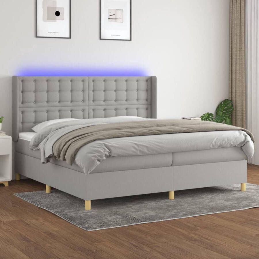 The Living Store Boxspring met matras en LED stof lichtgrijs 200x200 cm Bed