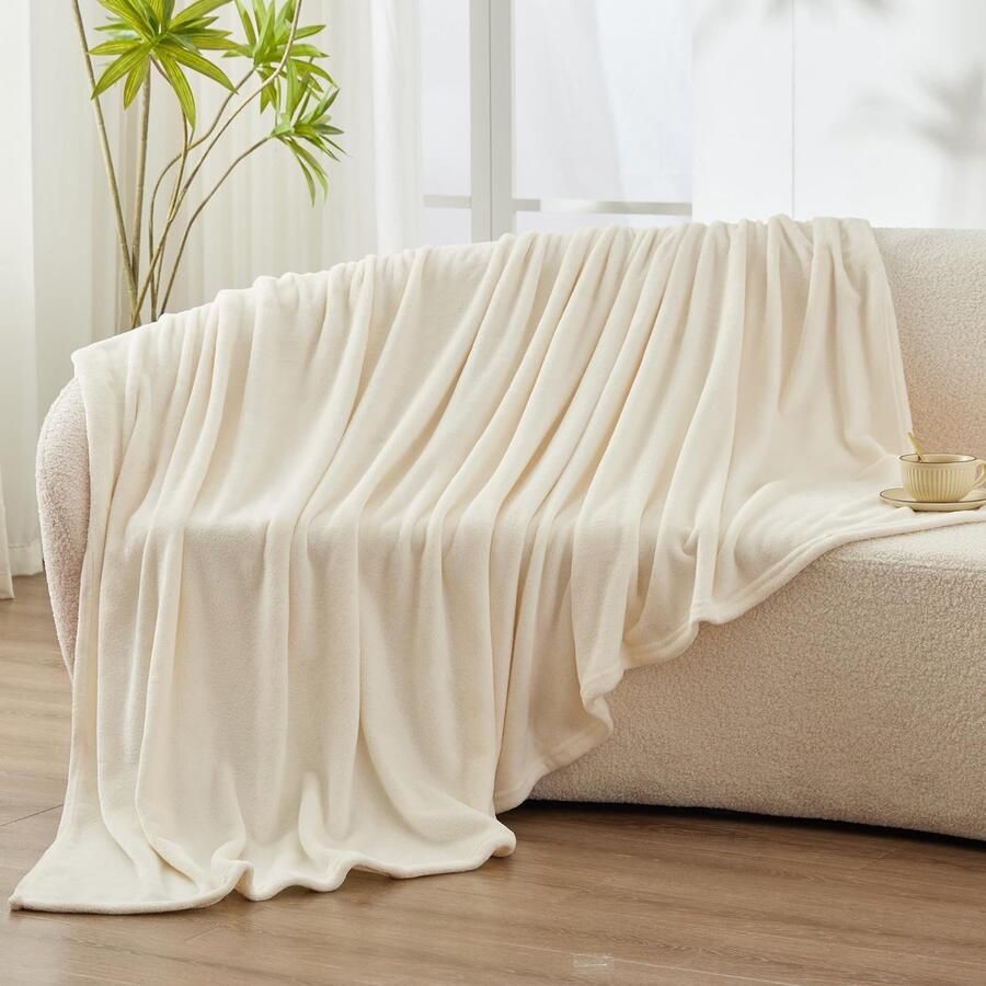 Unyqoos Superzachte en Veelzijdige Pluizige Deken voor Bank en Bed in Crème 130 x 150 cm