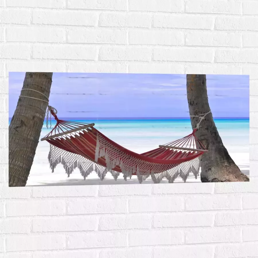WallClassics Muursticker Rode Ibiza Hangmat op Tropisch Strand 100x50 cm Foto op Muursticker